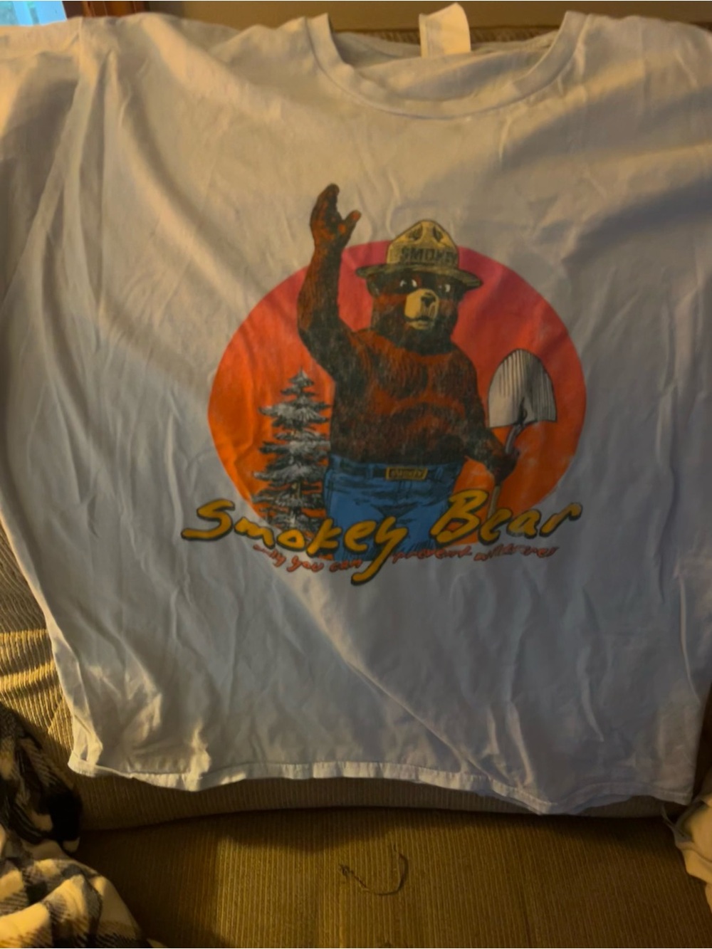 Port and Company White Smokey Bear Tee with Orange and Blue Graphic